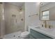 Updated bathroom with a glass shower, modern sink, and contemporary fixtures at 620 Red Carriage Ave, Durham, NC 27704