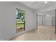 Bright, airy room with neutral walls and view of landscaped yard at 620 Red Carriage Ave, Durham, NC 27704