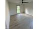 Bright bedroom with a ceiling fan and neutral paint at 620 Red Carriage Ave, Durham, NC 27704