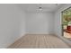 Clean, simple bedroom with ceiling fan, window, and neutral decor at 620 Red Carriage Ave, Durham, NC 27704