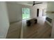 Bright living room featuring new flooring, fireplace and access to the outdoors at 620 Red Carriage Ave, Durham, NC 27704