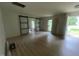 Spacious living room area, with glass sliding doors and neutral walls at 620 Red Carriage Ave, Durham, NC 27704