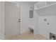 Mud Room features a door to the outside, seating, and overhead storage at 620 Red Carriage Ave, Durham, NC 27704