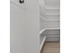 Pantry features bright white walls and shelves with light wood-look flooring at 620 Red Carriage Ave, Durham, NC 27704