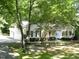 Inviting two-story home with a manicured lawn and attached garage at 637 Shadywood Ln, Raleigh, NC 27603