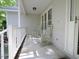 Cozy front porch with rocking chairs, perfect for relaxing outdoors at 637 Shadywood Ln, Raleigh, NC 27603
