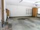Spacious garage with storage cabinets and room for parking at 637 Shadywood Ln, Raleigh, NC 27603