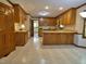 Functional kitchen with wooden cabinets and ample counter space at 637 Shadywood Ln, Raleigh, NC 27603