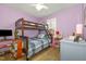 The bedroom features a bunk bed, hardwood floors, and a window at 713 Saint Catherines Dr, Wake Forest, NC 27587