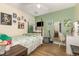 This bedroom features a ceiling fan, a bed, and a mirror at 713 Saint Catherines Dr, Wake Forest, NC 27587