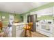 Bright eat-in kitchen with modern appliances and plenty of cabinet space at 713 Saint Catherines Dr, Wake Forest, NC 27587