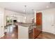 Open kitchen with granite countertops, stainless steel appliances, and view of the living room at 7250 Nc 751 Highway, #1205, Durham, NC 27707