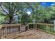 Newly constructed back deck overlooks the expansive, tree-filled yard at 8 Great Oak Ct, Durham, NC 27713