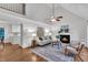 Bright living room features hardwood floors, fireplace, high ceilings, and neutral paint at 8 Great Oak Ct, Durham, NC 27713