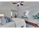 Spacious main bedroom boasts a ceiling fan, and hardwood flooring at 8 Great Oak Ct, Durham, NC 27713