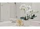 Bright bathroom with decorative accents and neutral color palette at 8151 Rhiannon Rd, Raleigh, NC 27613