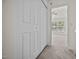 Hallway with carpet floors, a large closet and access to a bedroom at 8151 Rhiannon Rd, Raleigh, NC 27613