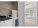Modern laundry area near main bedroom offers convenience at 8151 Rhiannon Rd, Raleigh, NC 27613
