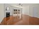 The living room features a fireplace, laminate wood floors and sliding door access to the backyard at 8151 Rhiannon Rd, Raleigh, NC 27613