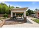 A covered picnic area with tables and greenery at 8151 Rhiannon Rd, Raleigh, NC 27613