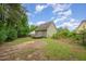 Backyard view with deck, exterior, fencing, and foliage at 816 Kimpton Ct, Fuquay Varina, NC 27526