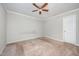 Basic bedroom with ceiling fan and carpeted flooring at 816 Kimpton Ct, Fuquay Varina, NC 27526