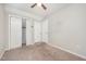 Bedroom with carpet, closet, ceiling fan, and neutral-toned walls at 816 Kimpton Ct, Fuquay Varina, NC 27526