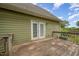 Wooden deck and back door with green exterior at 816 Kimpton Ct, Fuquay Varina, NC 27526