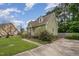 Charming home showcasing lush landscaping, a well-manicured lawn, and a private driveway at 816 Kimpton Ct, Fuquay Varina, NC 27526