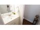 Cozy powder room with vanity, decorative mirror, and stylish decor offering a charming space at 966 Airedale Trl, Garner, NC 27529