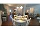 Dining area between the kitchen and living room, offering a seamless transition for entertaining and Gathering gatherings at 966 Airedale Trl, Garner, NC 27529