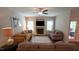 Comfortable living room features a fireplace, stylish furnishings, and plenty of natural light at 966 Airedale Trl, Garner, NC 27529