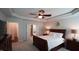 Bright main bedroom features ensuite bathroom and walk-in closet with tray ceilings and comfortable design at 966 Airedale Trl, Garner, NC 27529