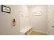 Welcoming mud room featuring white hall tree and tile floors, offering functionality and style at 966 Airedale Trl, Garner, NC 27529