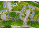 An aerial view shows the community layout, including a pool, parking, and green spaces at 1002 Willow Drive # 63, Chapel Hill, NC 27514