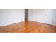 Sunlit bedroom with beautiful hardwood floors and fresh paint, ready for a new owner's personal touch at 1002 Willow Drive # 63, Chapel Hill, NC 27514