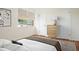 Staged bedroom with a cozy bed, natural light, and closet at 1002 Willow Drive # 63, Chapel Hill, NC 27514