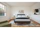 Inviting bedroom featuring stylish decor, hardwood floors, and natural light, perfect for relaxation at 1002 Willow Drive # 63, Chapel Hill, NC 27514