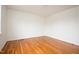 Sunny bedroom featuring gleaming hardwood floors, awaiting personalization to suit any style at 1002 Willow Drive # 63, Chapel Hill, NC 27514