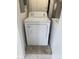 Amana brand dryer in laundry room with tile floor and white walls at 1002 Willow Drive # 63, Chapel Hill, NC 27514