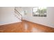 Bright entryway with parquet flooring and stairs, creating an inviting space at 1002 Willow Drive # 63, Chapel Hill, NC 27514