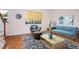 Cozy living room showcases comfortable seating, a contemporary rug, and modern decor at 1002 Willow Drive # 63, Chapel Hill, NC 27514