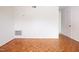 Bright empty living room with hardwood floors ready for your personal touch at 1002 Willow Drive # 63, Chapel Hill, NC 27514