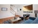 Cozy living room featuring hardwood floors, modern furniture, and abundant natural light at 1002 Willow Drive # 63, Chapel Hill, NC 27514