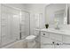 Contemporary bathroom with a glass-enclosed shower, tile flooring, and a single sink vanity at 106 S Buggy Dr # 70, Benson, NC 27504