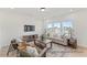 Inviting living room with natural light, comfortable sofa, and stylish furnishings at 106 S Buggy Dr # 70, Benson, NC 27504