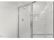 Modern walk-in shower with white subway tile and chrome fixtures at 106 S Buggy Dr # 70, Benson, NC 27504