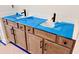 Modern bathroom with double vanities, granite countertops, and wood cabinetry at 1079 Fairhaven Dr # 50, Mebane, NC 27302