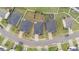 Suburban neighborhood aerial view showing well-maintained lawns and neatly arranged one-story homes at 119 Yadkin St, Clayton, NC 27520