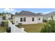 Back of the house with AC and white fence at 119 Yadkin St, Clayton, NC 27520